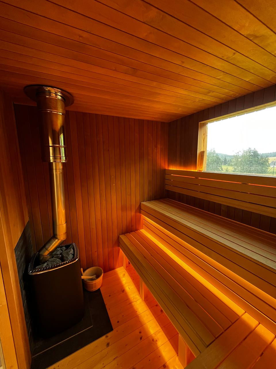 Sauna — interiér s kamny